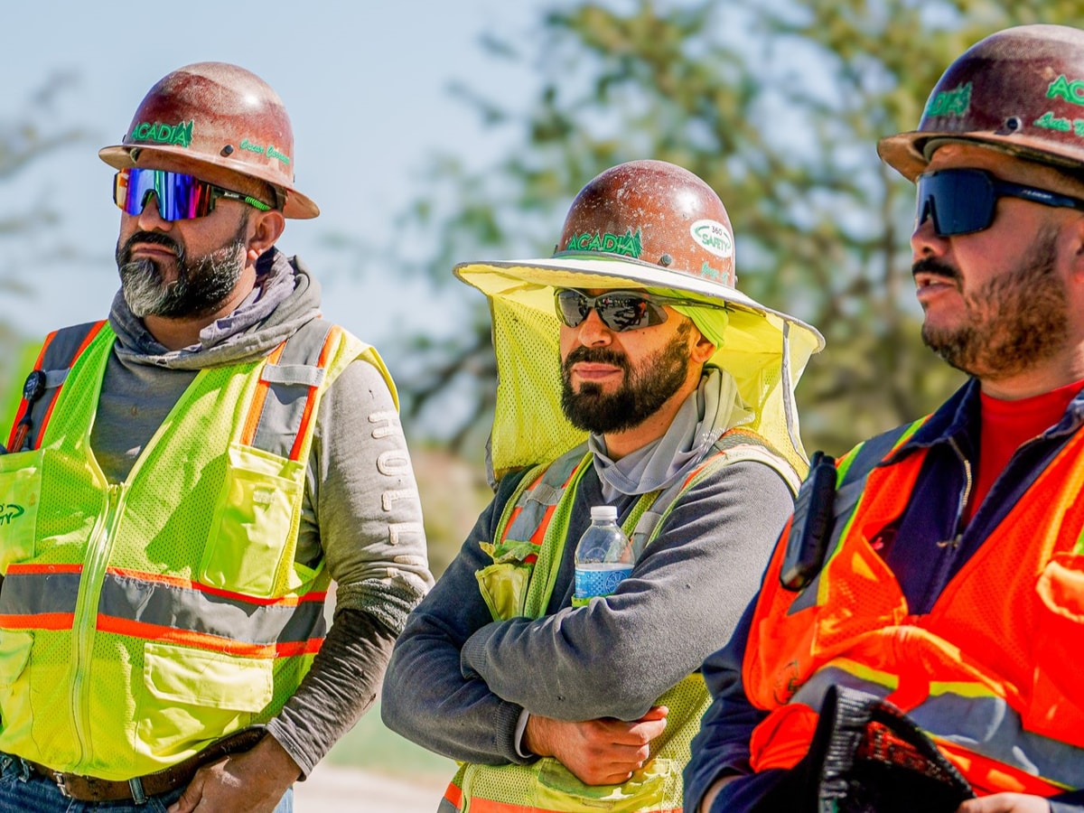 Acadia field crew in safety gear on site