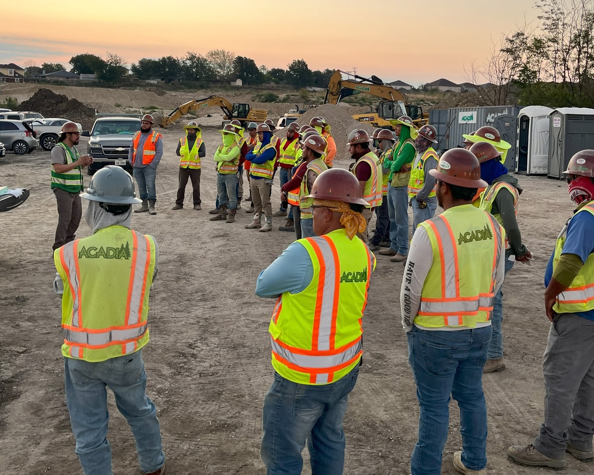 Acadia crew gathered for an on-site safety meeting