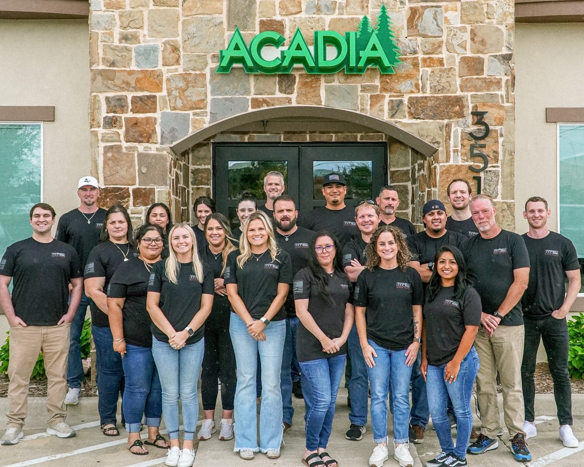Acadia team photo outside the Southlake office