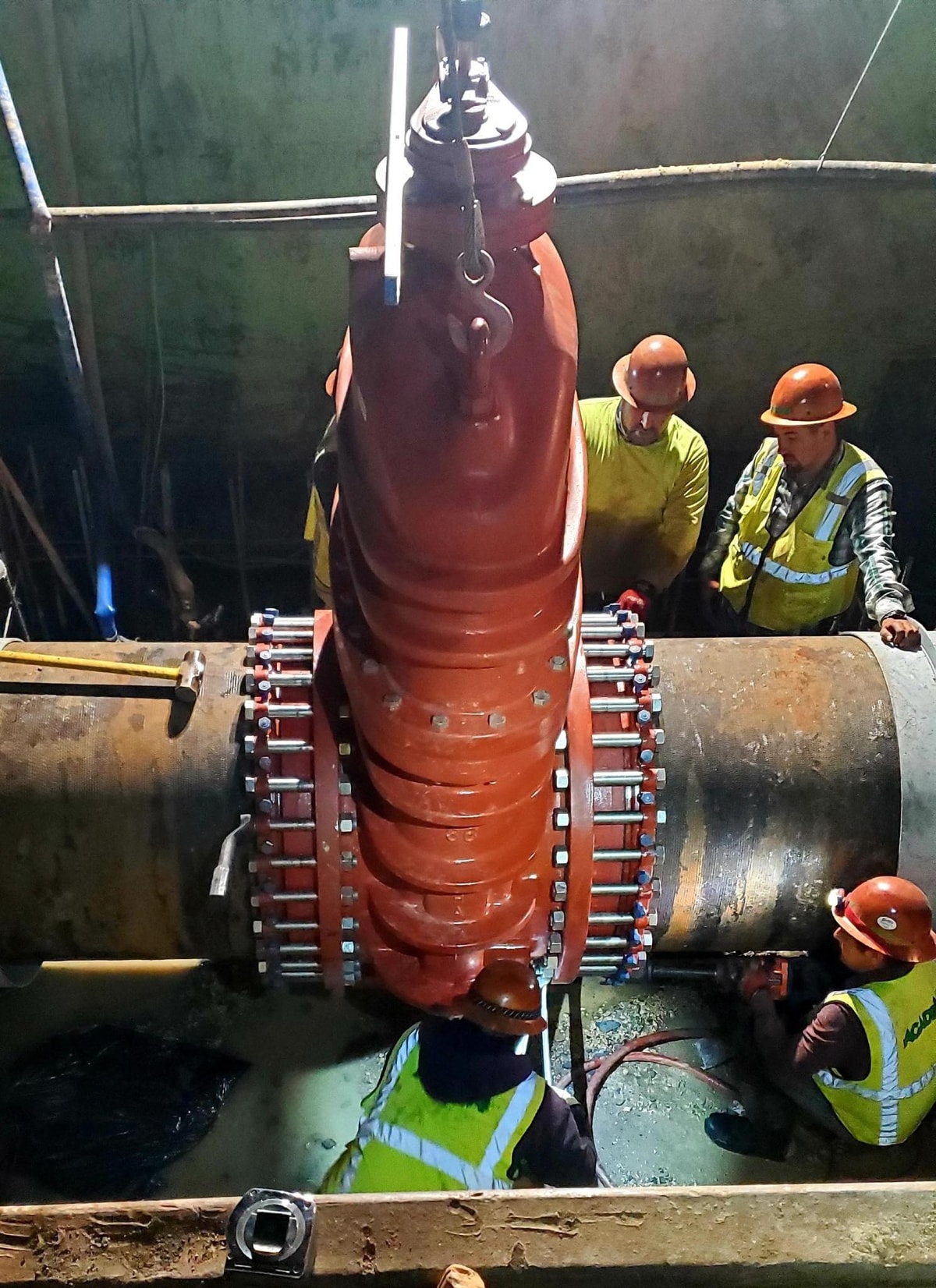 Crew repairing a 36-inch pipe during an emergency repair