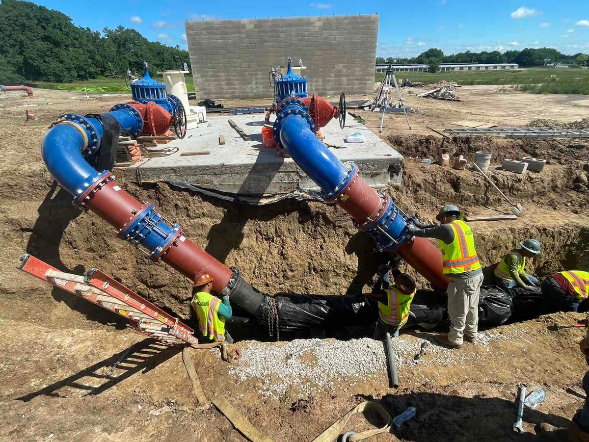 Meter and pump station piping being assembled on site