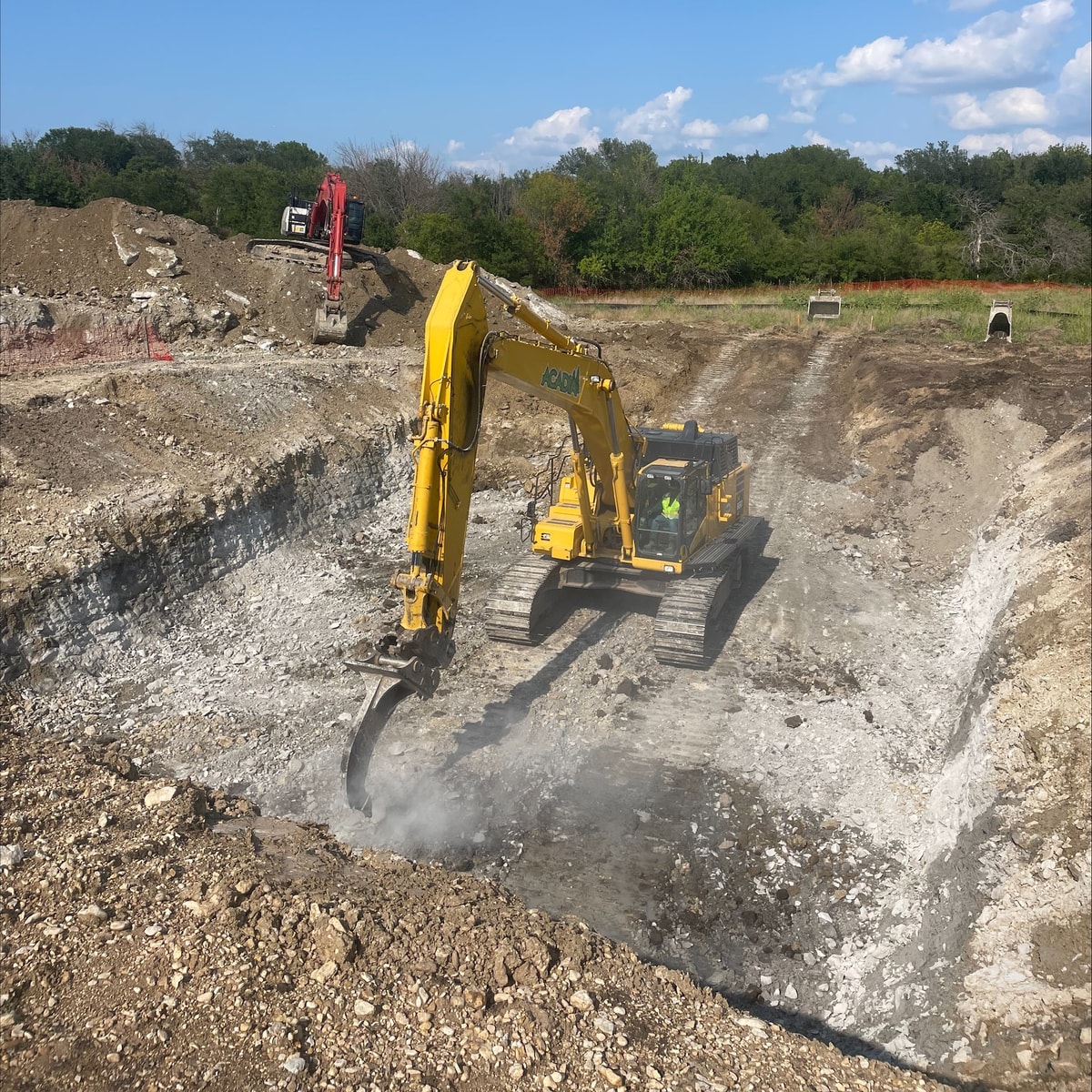 Excavator digging at Hickory Grove Phase